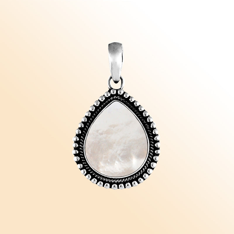 "Sterling silver pear-shaped pendant with shimmering mother of pearl and decorative rope border, handcrafted Bali artisan jewelry."