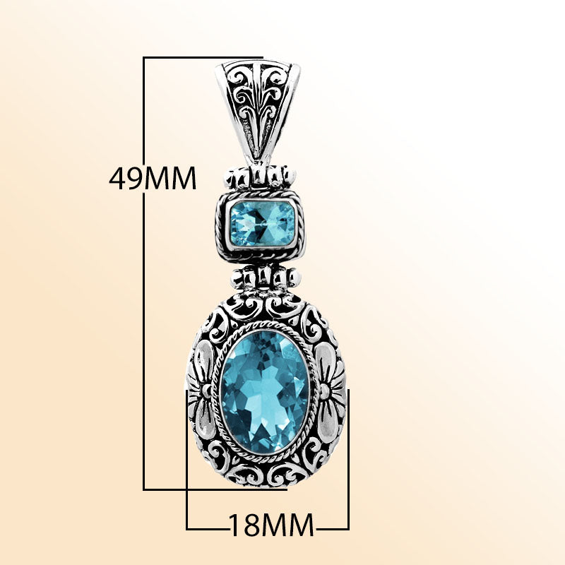 Sterling silver Blue Topaz pendant with oval and square Quartz, detailed Bali filigree silverwork and oxidized finish, handcrafted artisan jewelry for women.