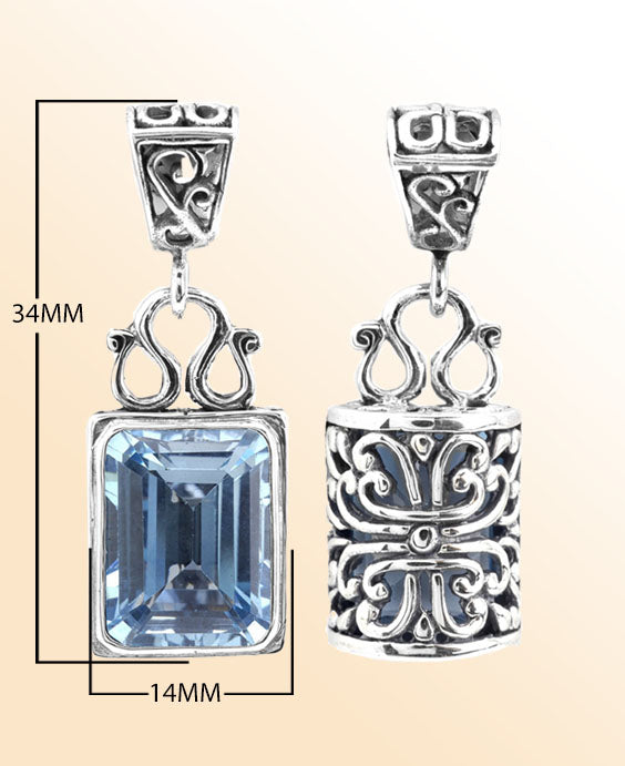 Sterling silver rectangular Blue Topaz pendant with faceted Quartz and intricate Bali silverwork, handcrafted artisan jewelry for women.