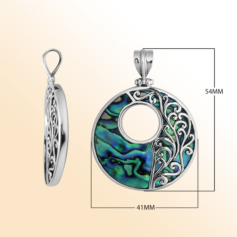 Sterling silver round Abalone shell pendant with vibrant blue-green inlay, Bali-inspired vine detailing and oxidized finish, handcrafted artisan jewelry for women.
