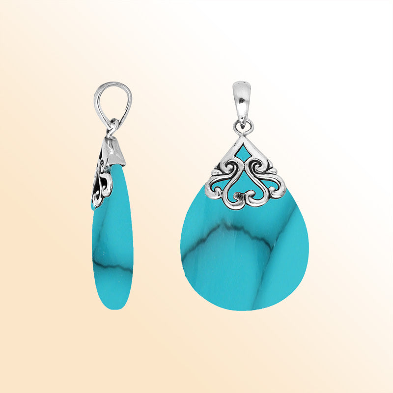 Sterling silver teardrop pendant with natural Turquoise Shell – handcrafted Bali jewelry with elegant scrollwork, a vibrant and meaningful gift