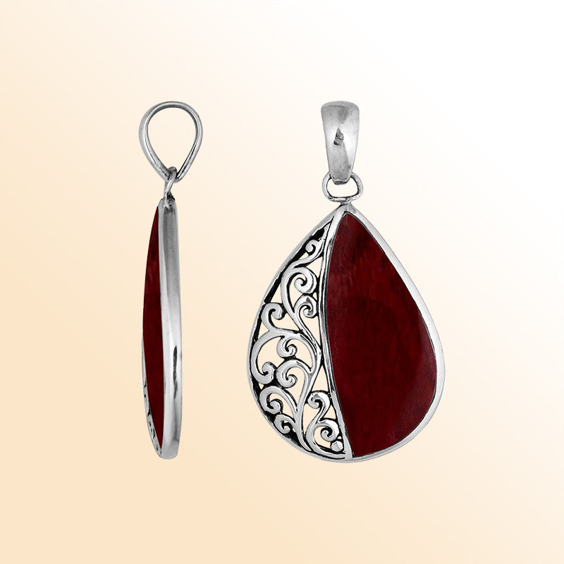 Sterling silver teardrop pendant with vibrant Red Coral – handcrafted Bali jewelry with elegant filigree, a bold and meaningful gift