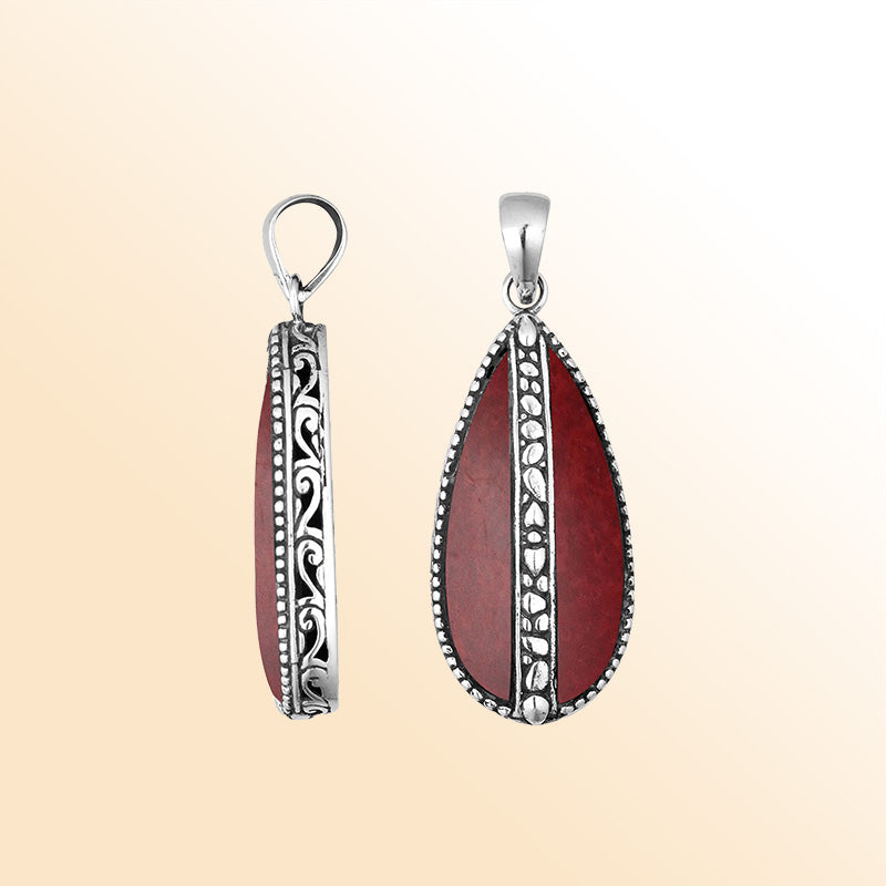 Sterling silver teardrop pendant with vibrant red coral – handcrafted Bali jewelry, a bold and meaningful gift