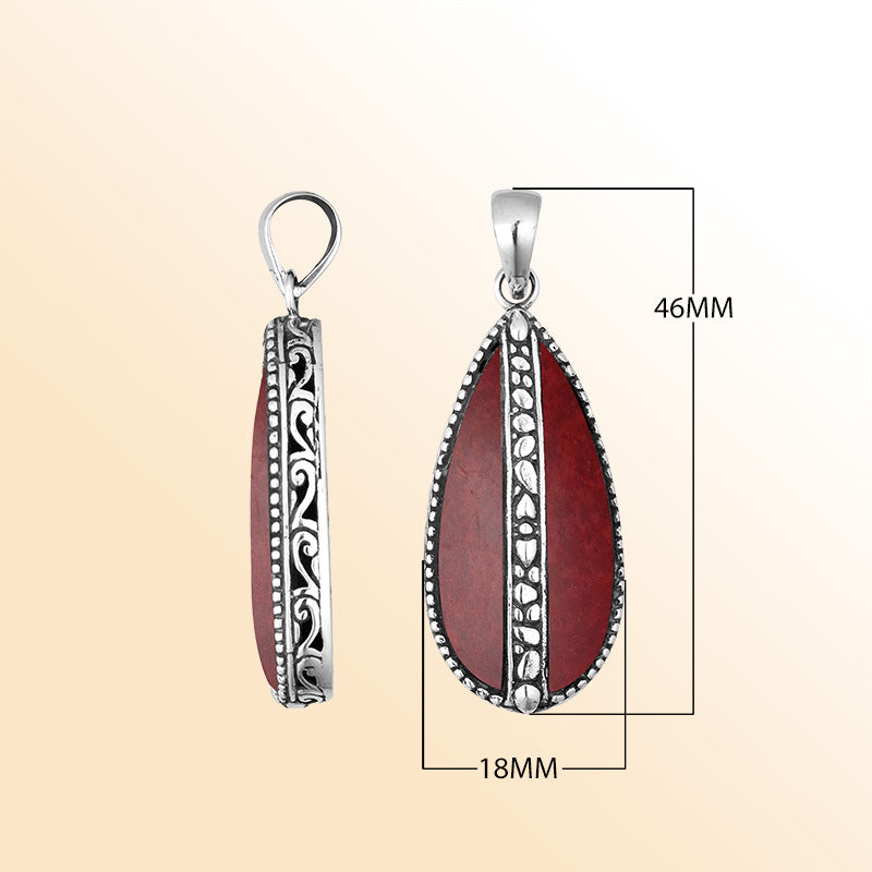 Sterling silver teardrop pendant with vibrant red coral – handcrafted Bali jewelry, a bold and meaningful gift