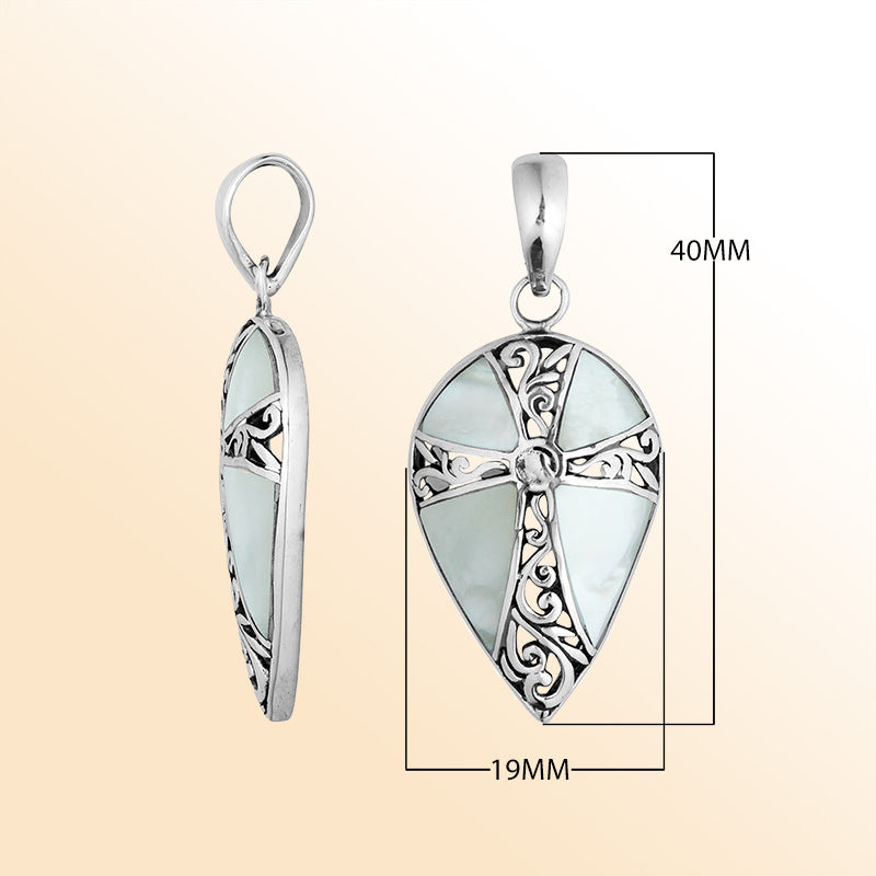 Sterling silver teardrop cross pendant with luminous Mother of Pearl – handcrafted Bali jewelry, a meaningful gift