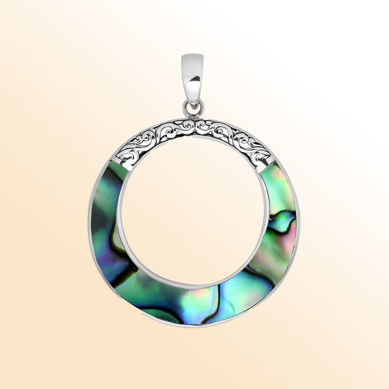 Sterling silver round pendant with abalone shell inlay, open circle design, and ornate silver carving – handcrafted artisan jewelry