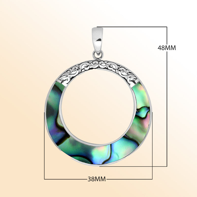 Sterling silver round pendant with abalone shell inlay, open circle design, and ornate silver carving – handcrafted artisan jewelry