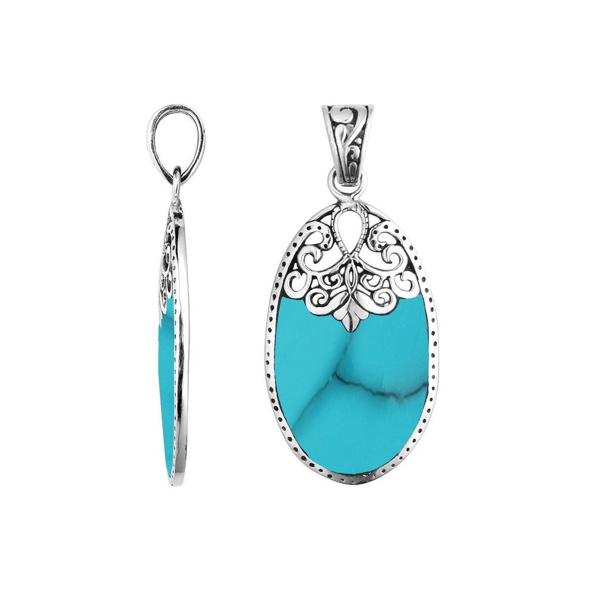 Sterling silver oval pendant with vibrant turquoise inlay and delicate Balinese filigree design, handcrafted in Bali.
