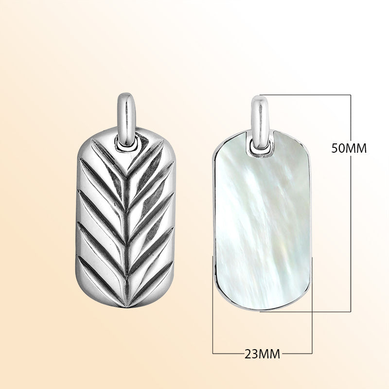 Sterling silver rectangular pendant with shimmering mother of pearl inlay and chevron design, handcrafted Bali artisan jewelry for modern everyday style.