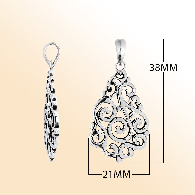 Sterling silver teardrop pendant with elegant swirl filigree design, handcrafted Bali artisan jewelry for everyday and special occasion wear.