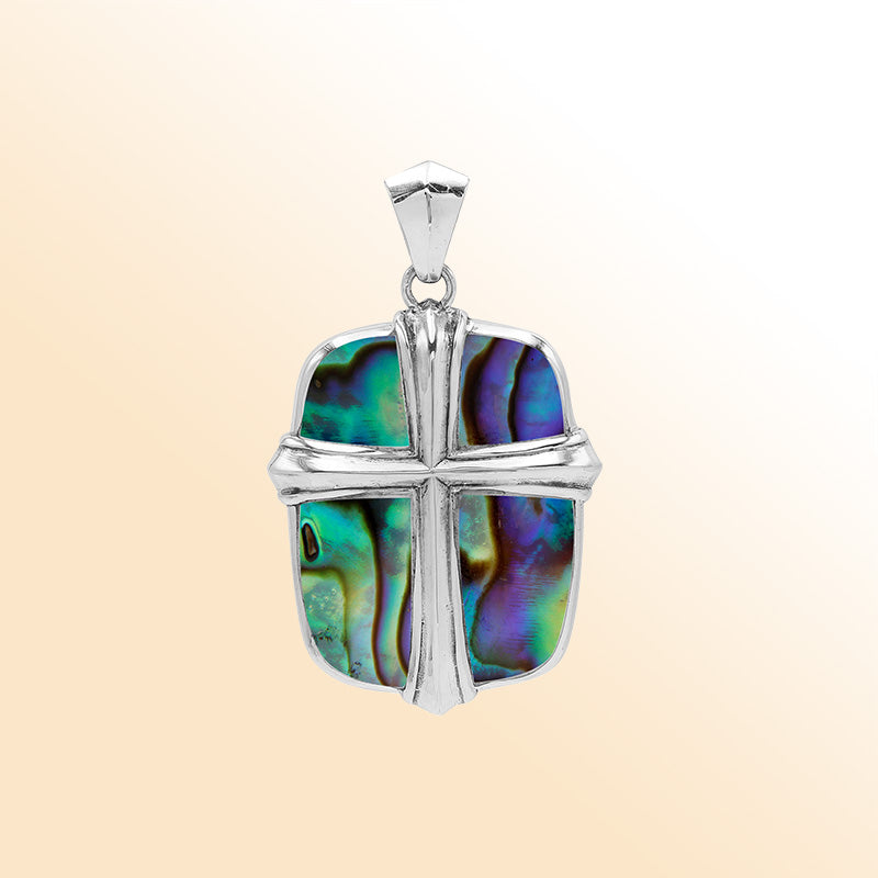 Sterling silver cross pendant with vibrant abalone shell inlay, handcrafted Bali jewelry with iridescent ocean-inspired colors.