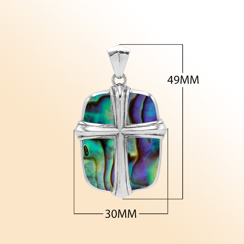 Sterling silver cross pendant with vibrant abalone shell inlay, handcrafted Bali jewelry with iridescent ocean-inspired colors.