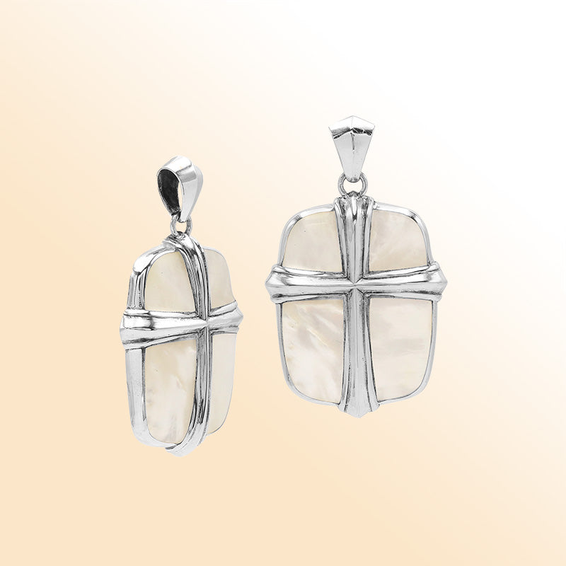 Sterling silver cross pendant with luminous mother of pearl shell inlay, handcrafted Bali jewelry with elegant natural shine.