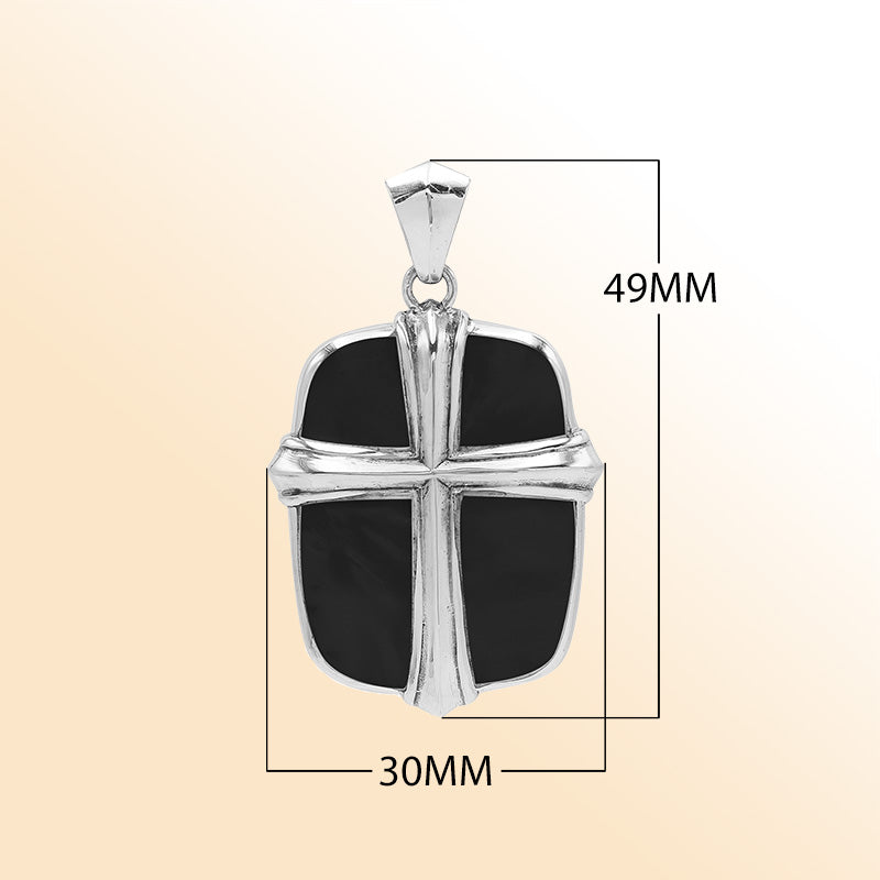 Handcrafted sterling silver cross pendant with glossy black shell inlay, elegant Bali artisan jewelry for everyday wear.