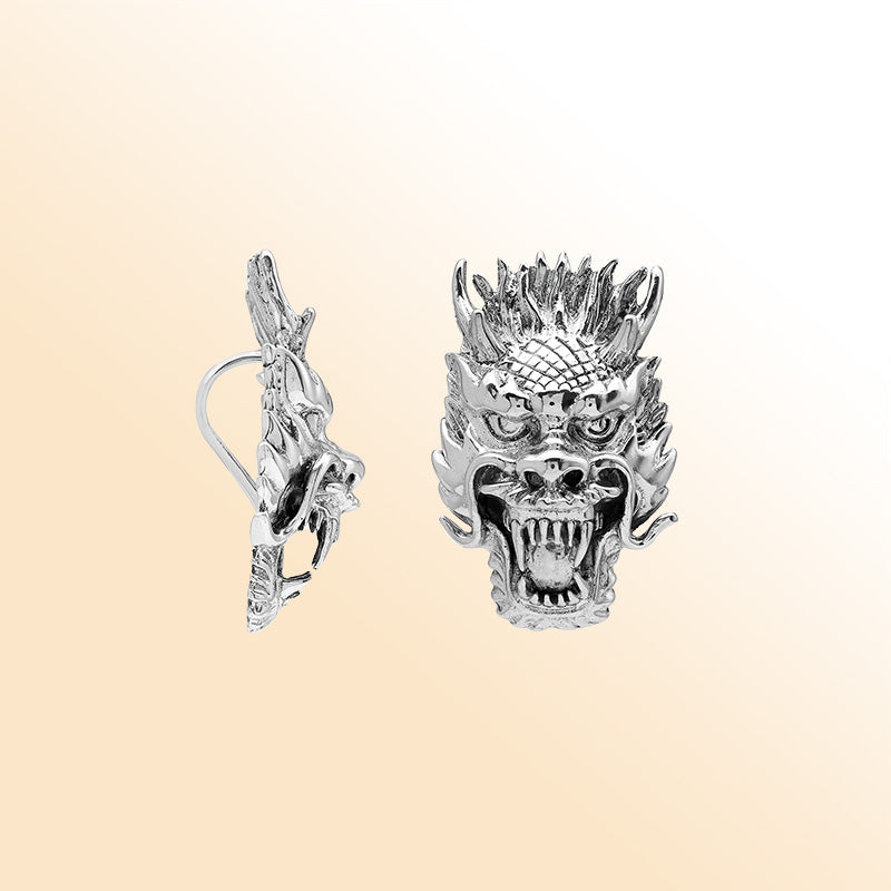Sterling silver dragon head pendant with detailed carving and oxidized finish, handcrafted Bali artisan jewelry for bold everyday style.
