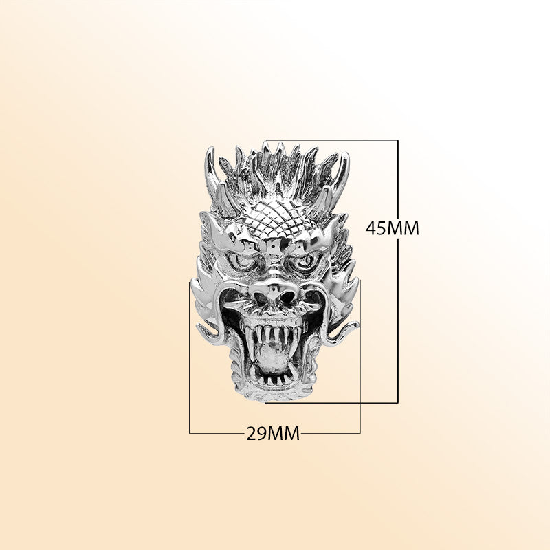 Sterling silver dragon head pendant with detailed carving and oxidized finish, handcrafted Bali artisan jewelry for bold everyday style.