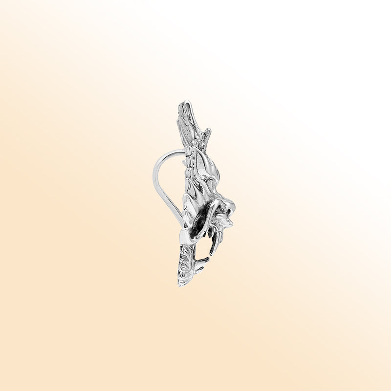 Sterling silver dragon head pendant with detailed carving and oxidized finish, handcrafted Bali artisan jewelry for bold everyday style.