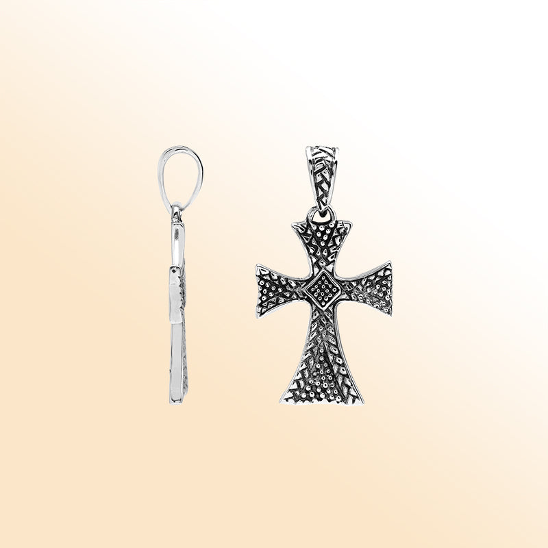 Sterling silver cross pendant with intricate textured detailing and oxidized accents, handcrafted Bali artisan jewelry for spiritual everyday wear.