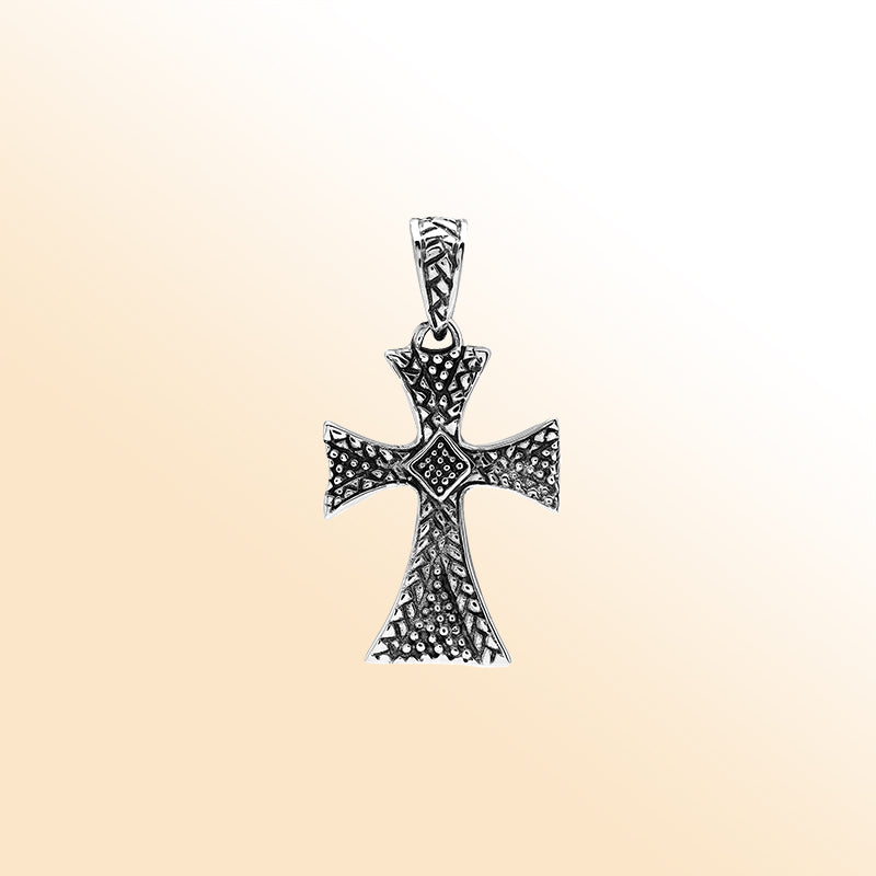Sterling silver cross pendant with intricate textured detailing and oxidized accents, handcrafted Bali artisan jewelry for spiritual everyday wear.