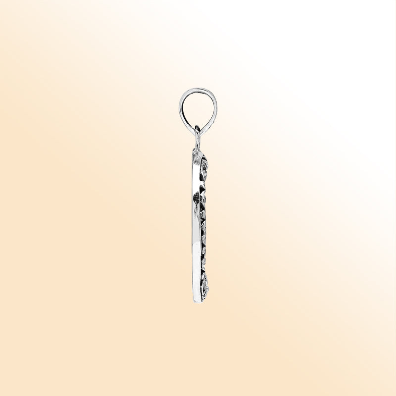 Sterling silver round pendant with shimmering abalone shell and floral detailing, handcrafted Bali artisan jewelry for elegant everyday wear.