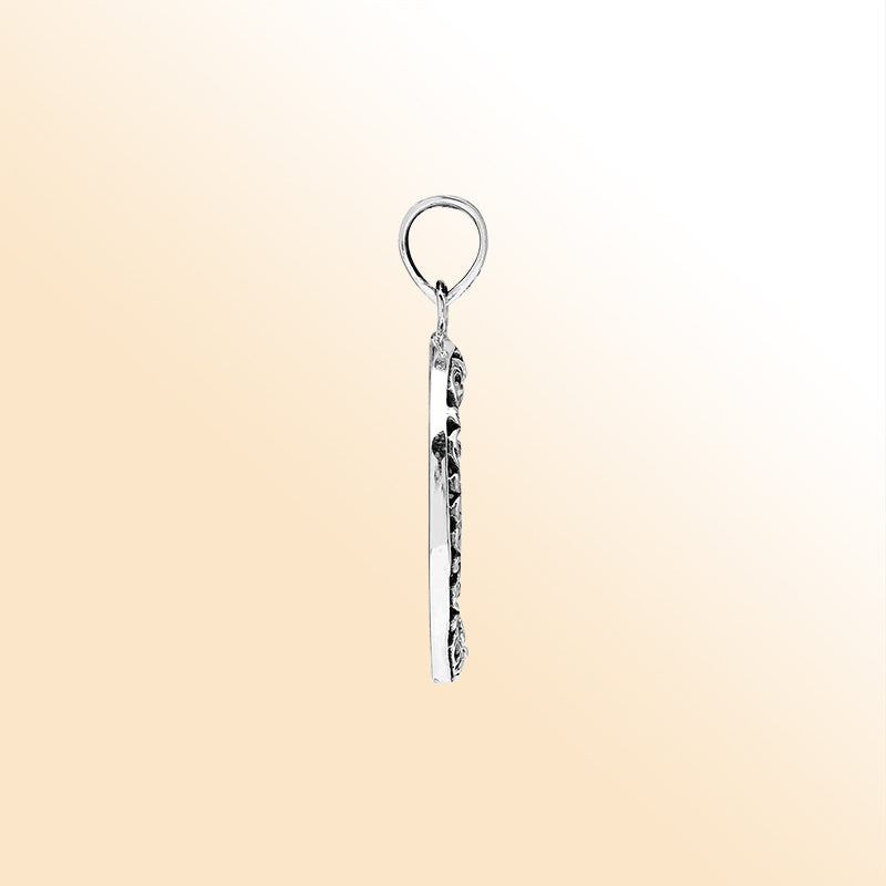Sterling silver round pendant with luminous mother of pearl and floral Bali frame, handcrafted artisan jewelry for elegant everyday wear.