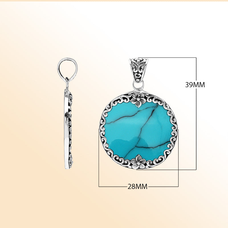 Handmade round turquoise pendant in sterling silver with floral Balinese detailing, elegant artisan jewelry for women.