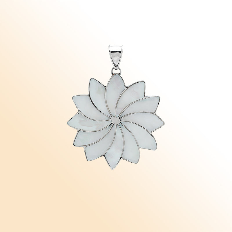Handmade sterling silver flower pendant with luminous Mother of Pearl petals, elegant artisan Bali jewelry for unisex.