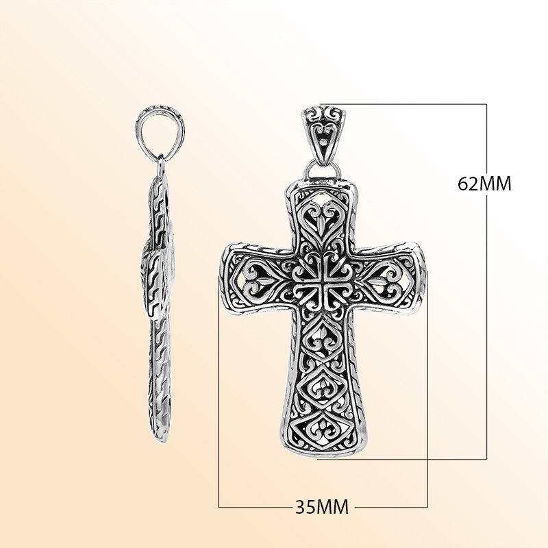 Handcrafted sterling silver ornate cross pendant with detailed Balinese scrollwork, elegant artisan jewelry for unisex.
