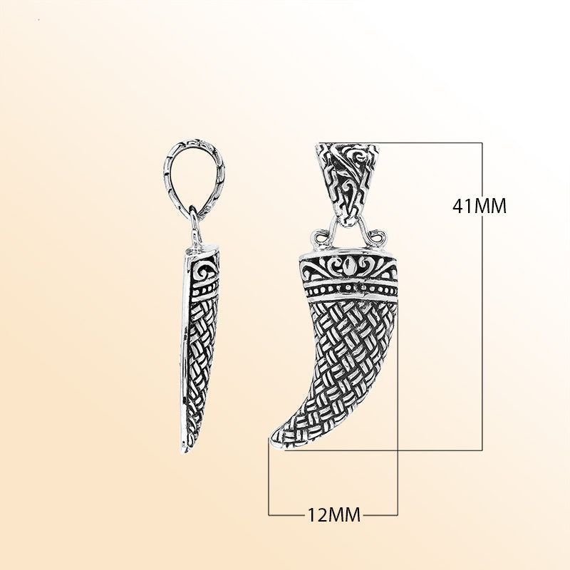 Handmade sterling silver tribal tooth pendant with detailed Balinese engravings, bold artisan unisex jewelry from Bali.