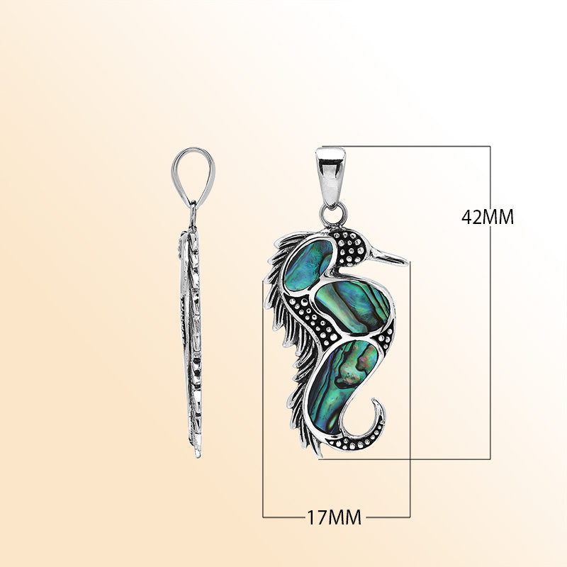 Sterling silver seahorse pendant with natural abalone shell, handcrafted in Bali – elegant ocean-inspired jewelry for everyday wear