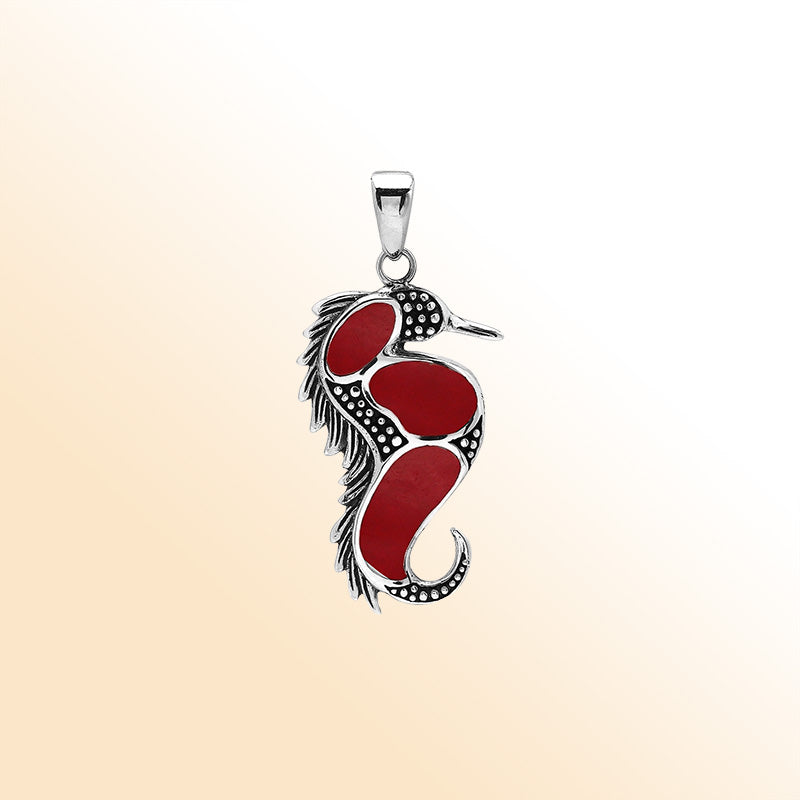 Sterling silver seahorse pendant with genuine red coral inlay, handcrafted in Bali – elegant ocean-inspired jewelry for everyday wear or gifting.