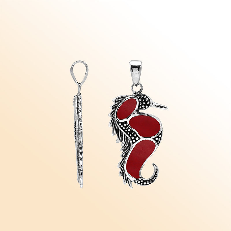 Sterling silver seahorse pendant with genuine red coral inlay, handcrafted in Bali – elegant ocean-inspired jewelry for everyday wear or gifting.