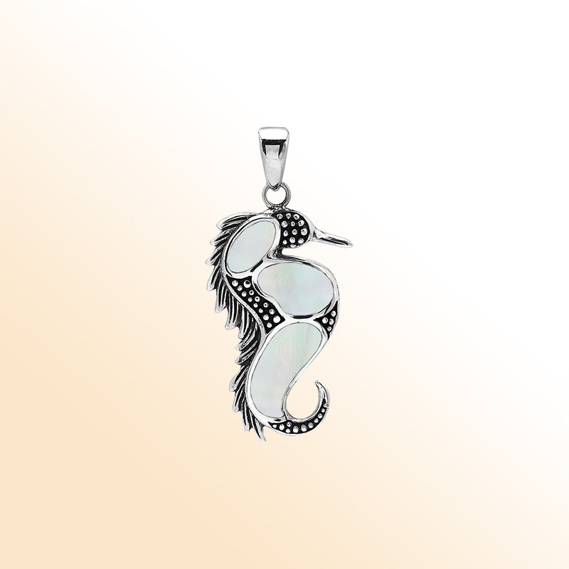 Sterling silver seahorse pendant with genuine mother of pearl inlay, handcrafted in Bali – elegant ocean-inspired jewelry for everyday wear or gifting.