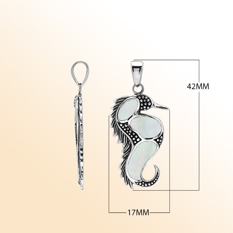 Sterling silver seahorse pendant with genuine mother of pearl inlay, handcrafted in Bali – elegant ocean-inspired jewelry for everyday wear or gifting.