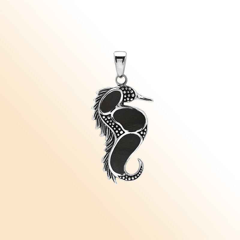 Sterling silver seahorse pendant with black shell inlay, handcrafted Bali jewelry inspired by the ocean.