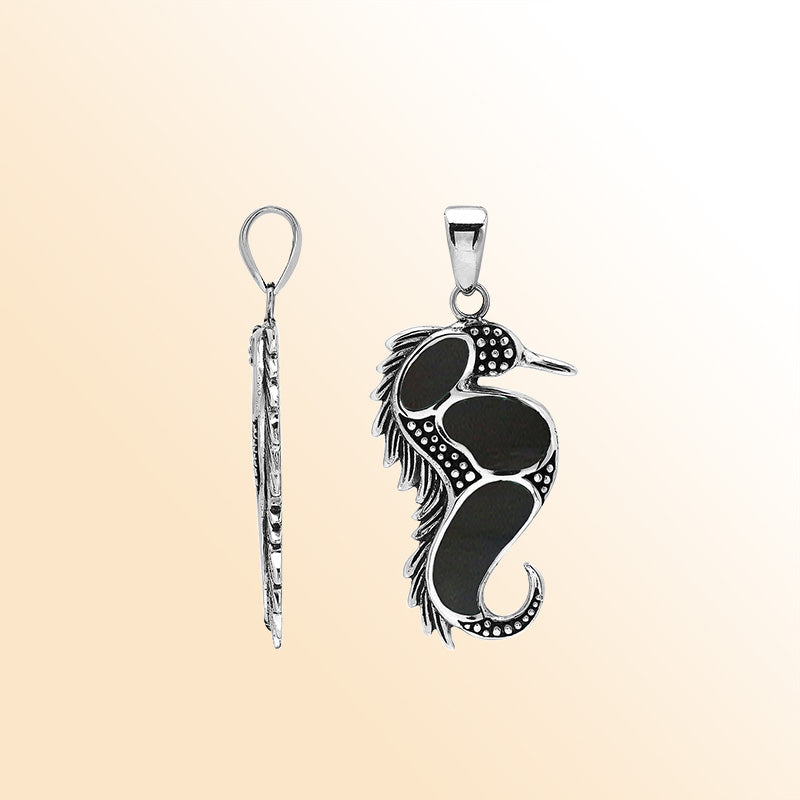 Sterling silver seahorse pendant with black shell inlay, handcrafted Bali jewelry inspired by the ocean.