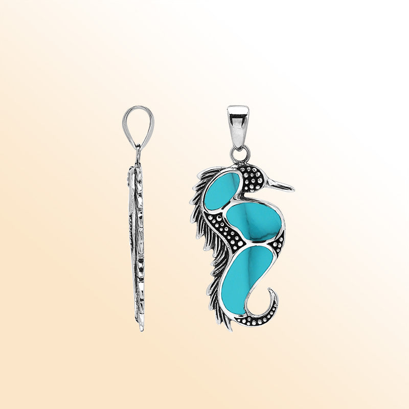 Sterling silver seahorse pendant with turquoise shell inlay, handcrafted Bali jewelry inspired by the ocean.