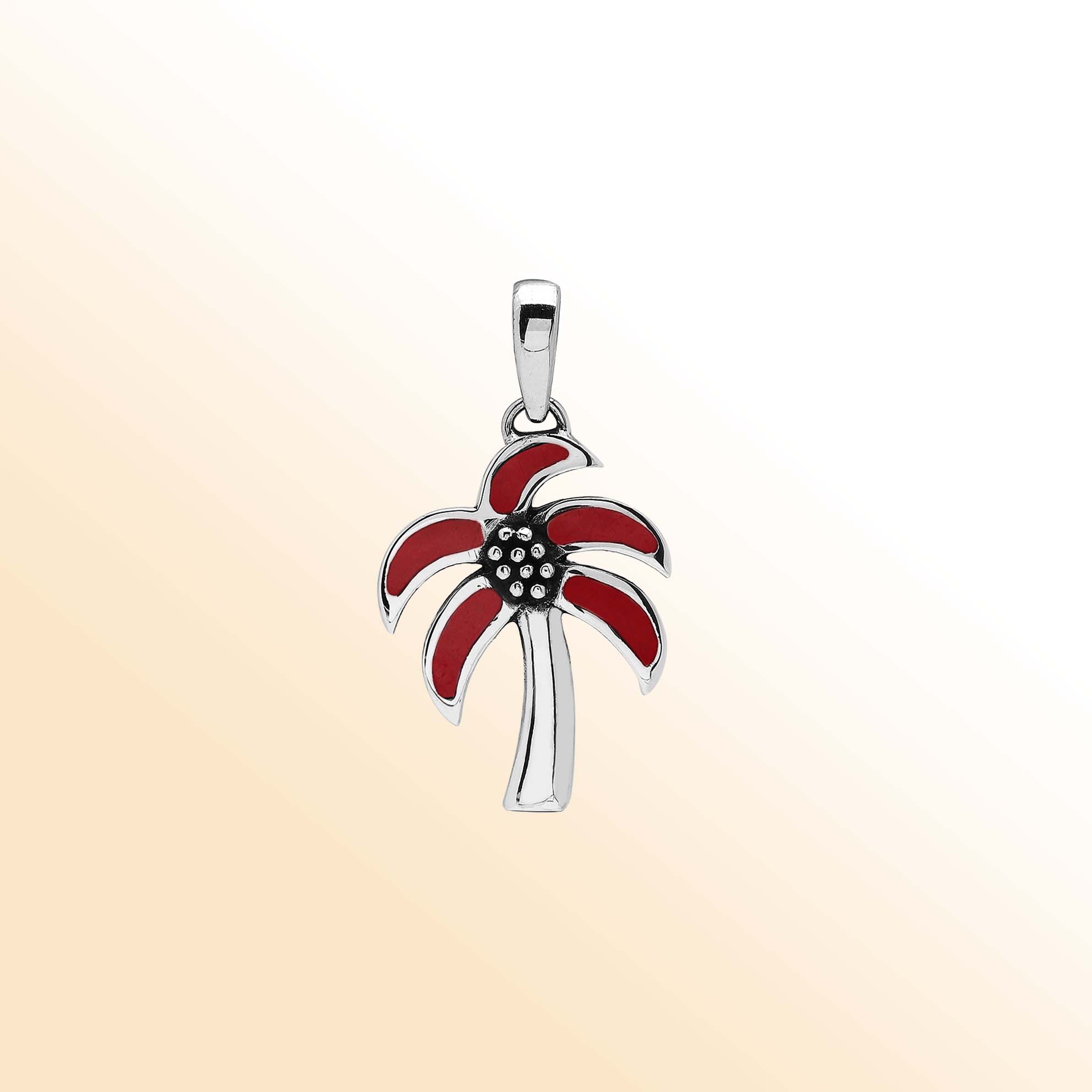 Tropical palm tree pendant in sterling silver with red coral inlay, artisan-crafted for casual beach jewelry style.