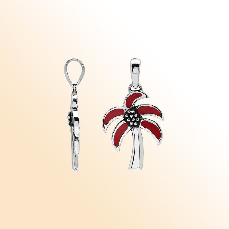 Tropical palm tree pendant in sterling silver with red coral inlay, artisan-crafted for casual beach jewelry style.