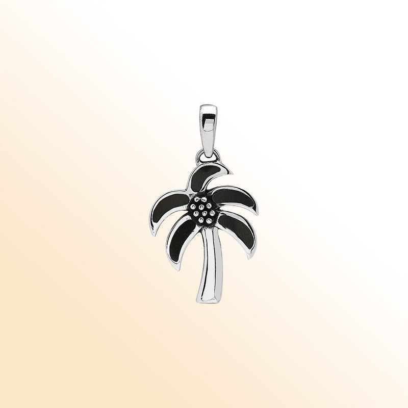 Tropical palm tree pendant in sterling silver with glossy black shell inlay, artisan-crafted for beach-inspired modern style.