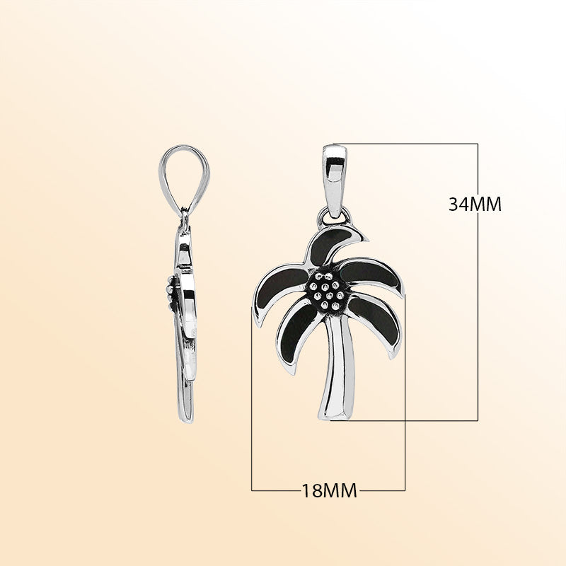 Tropical palm tree pendant in sterling silver with glossy black shell inlay, artisan-crafted for beach-inspired modern style.