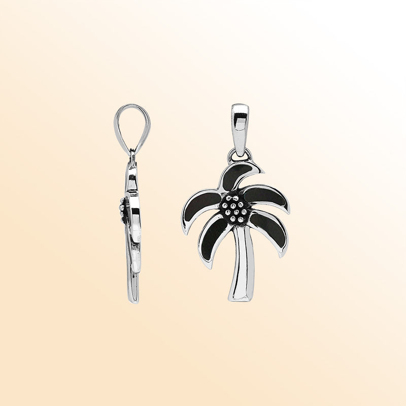 Tropical palm tree pendant in sterling silver with glossy black shell inlay, artisan-crafted for beach-inspired modern style.