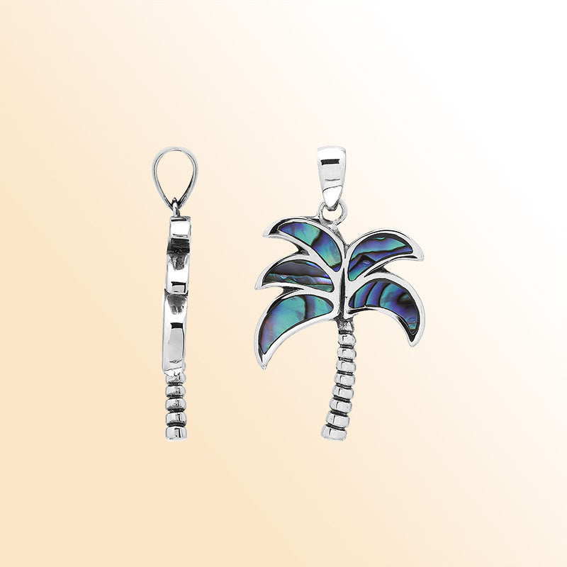 Tropical palm tree pendant in sterling silver with abalone shell inlay, artisan-crafted for exotic island-inspired style.