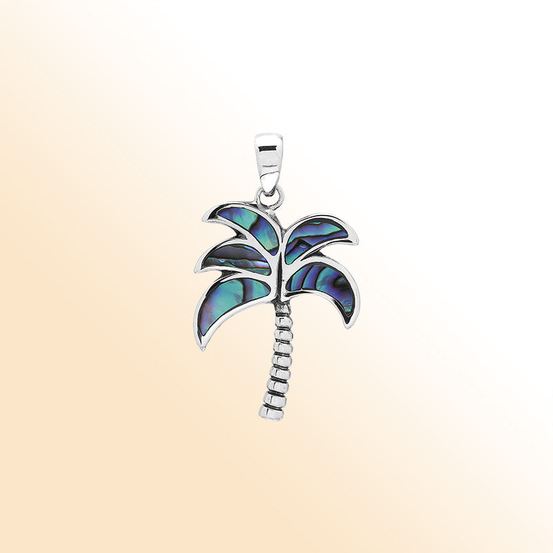 Tropical palm tree pendant in sterling silver with abalone shell inlay, artisan-crafted for exotic island-inspired style.