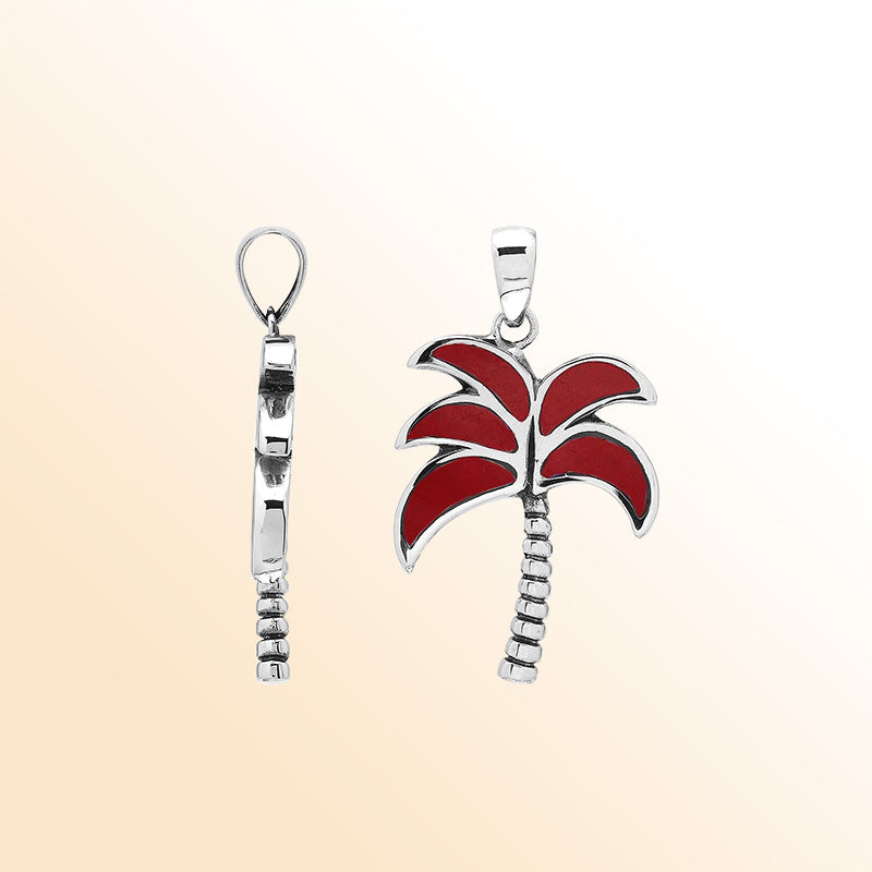 Bold tropical palm tree pendant in sterling silver with coral inlay, artisan-crafted for vibrant beach-inspired style.
