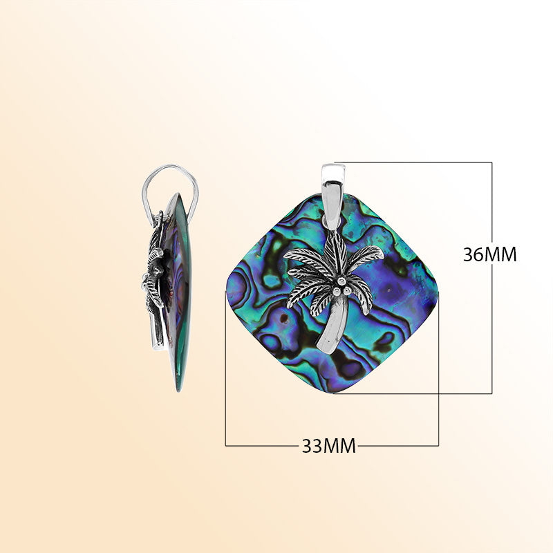 Statement palm tree pendant in sterling silver with abalone shell diamond backdrop, artisan-crafted for bold tropical style.