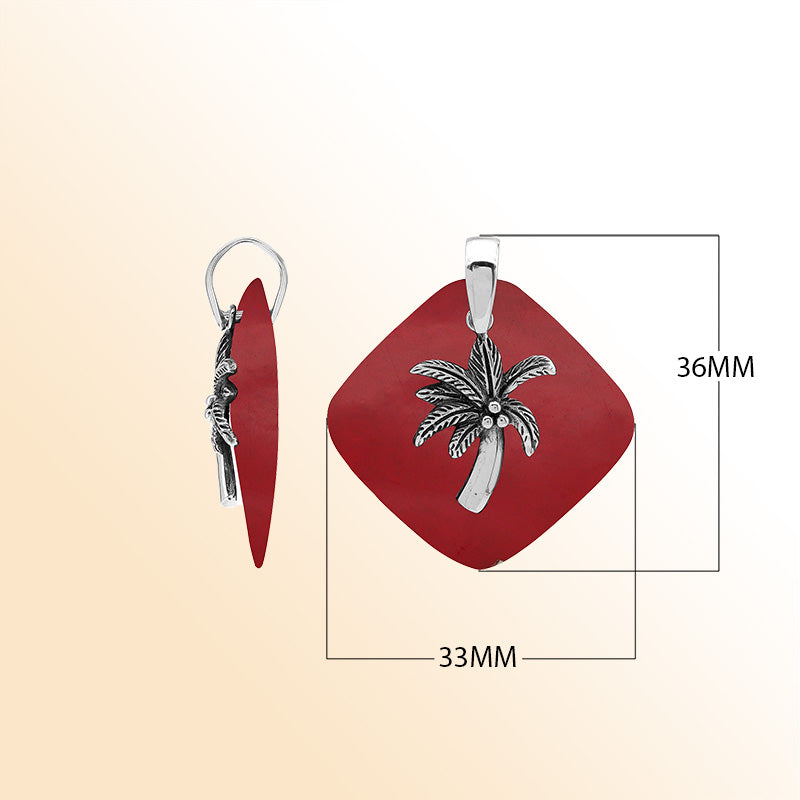 Bold sterling silver palm tree pendant set on red coral diamond base, artisan-crafted for tropical statement style.