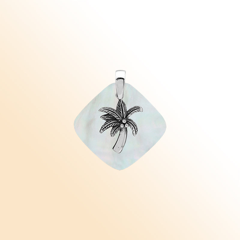 Elegant sterling silver palm tree pendant with Mother of Pearl diamond base, artisan-crafted for tropical coastal style.