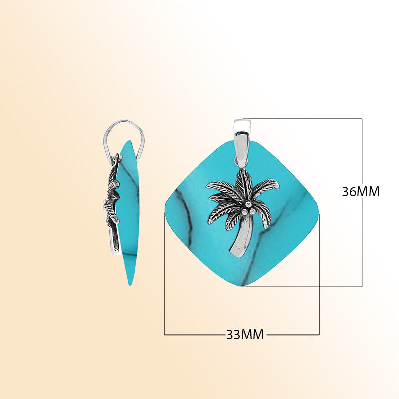 Vibrant sterling silver palm tree pendant with turquoise shell diamond base, artisan-crafted for bold tropical beach style.