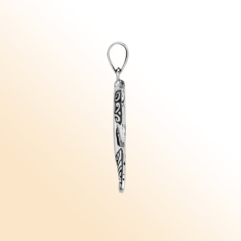 Bold sterling silver seahorse pendant with coral inlay, artisan-crafted for tropical ocean-inspired style.